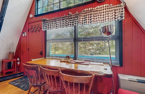 West Townshend House | Charming gingerbread A-frame situated on 3 acres, woodstove, A/C, deck