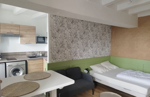 Le Vieil-Bauge Apartment | Charming studio at the foot of the twisted bell tower