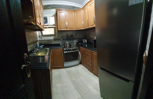 Giza Apartment | Charming sunset,with Panoramic Nile view and pyramid view.