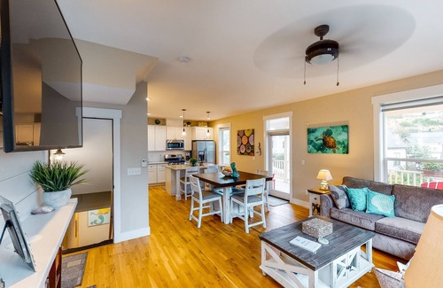 Olivia Beach House | Charming, three-story getaway w/two cozy living areas - walk to the beach