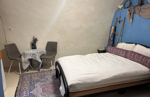 Artists Colony Bed & Breakfast | charming Tzimmer steps above the HaAri Mikvah and views of Meron
