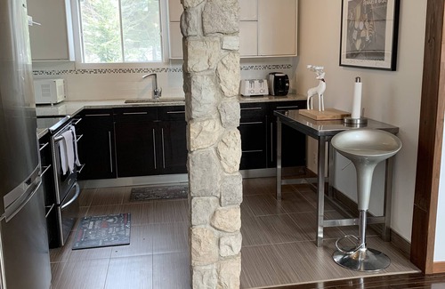 Riviere-Rouge Ski Chalet | Charming Waterfront Cottage 35 minutes from Mont-Tremblant