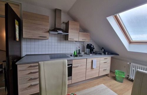 Rheinau House | Cheerful Roof Flat in a Private German Style Housen