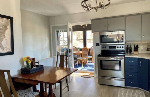 Council Bluffs House | Cheerful two bedroom home in quiet neighborhood. Sun Porch ~ Patio ~ Large yard