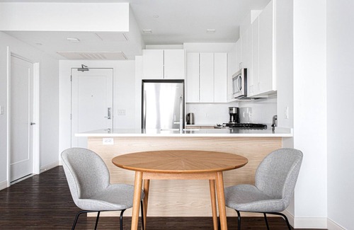 Newtonville Apartment | Chic 1BR w/Gym, W/D, Steps from Newtonville Train by Blueground