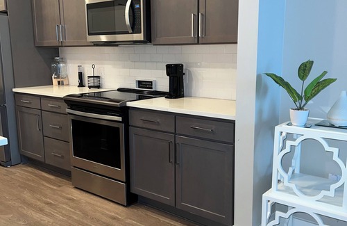 Sandy Springs Apartment | Chic 2-bedroom deluxe apartment with king beds, large Tvs, and a fitness center.