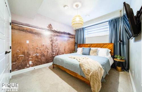 Southwest Edmonton Apartment | Chic Retreat with Hot Tub - King Bed - Fireplace - WEM