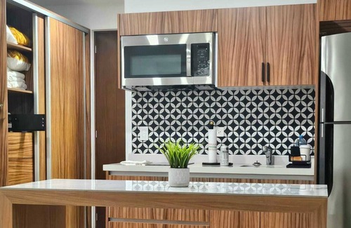 Tohoku Apartment | Chic Upper-Floor Condo with Rooftop Ocean Views Steps from Mamitas Beach 5th Ave
