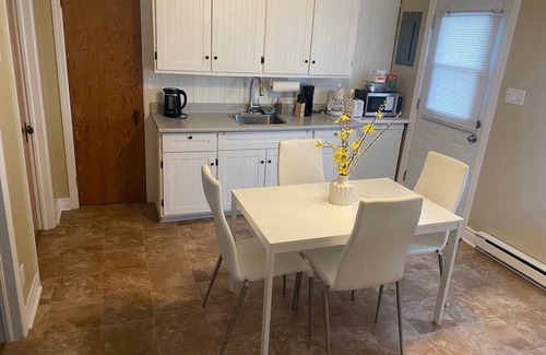 Saint-Edmond Apartment | Chic3-Bedroom Private Garden, Parking- Self check-in- 35Min from Montréal!
