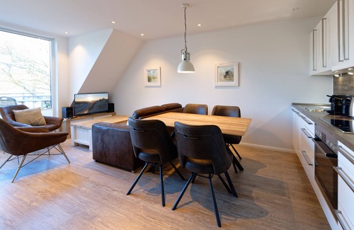 Langeoog Apartment | Child-friendly apartment with roof terrace, handcart & lots of toys