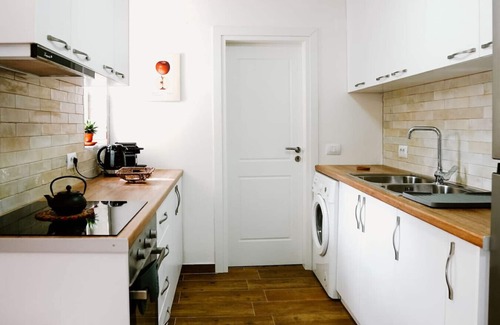 Gjirokaster House | City Grove: Blooms and Beds