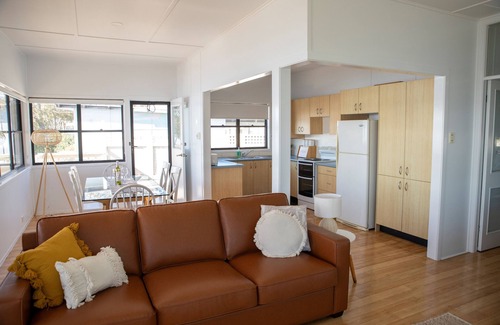 Sunshine Cottage | CLEARVIEW: A feel-good, sunny, north-facing waterfront lake house with jetty