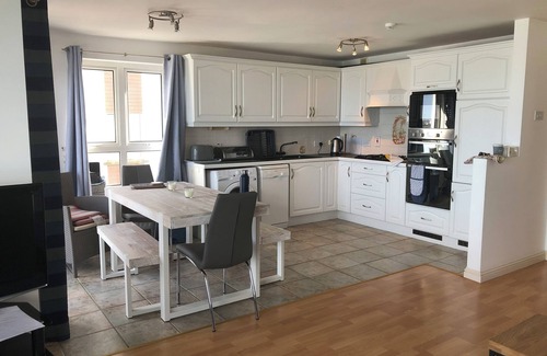 Portstewart Apartment | Close to Portrush golf with superb views of the north Irish Coast.Cool apartment