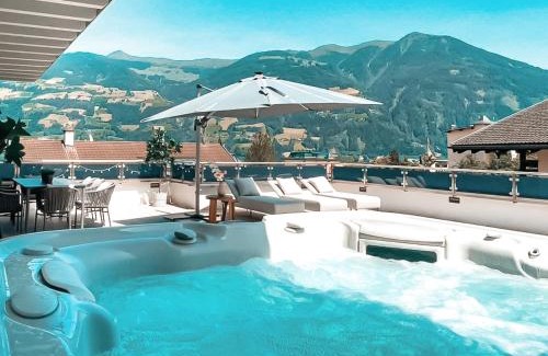Fuegen Apartment | CLOUD 9 - Penthouse with Private Rooftop Whirlpool & Terrace by AlpenLuxus