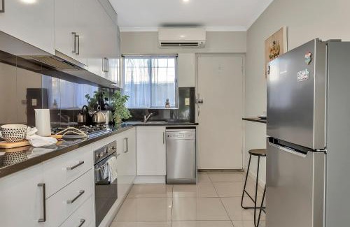 Henley Beach South Apartment | Coastal Comfort with a Pool opposite Henley Beach