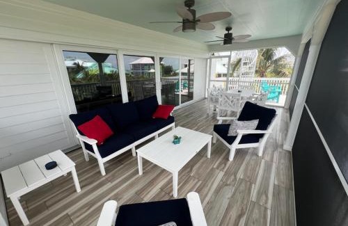 Jose's Hideaway House | Coconut Castaway - Ocean Views, Walk to Beach, Golf Cart, Club Pool