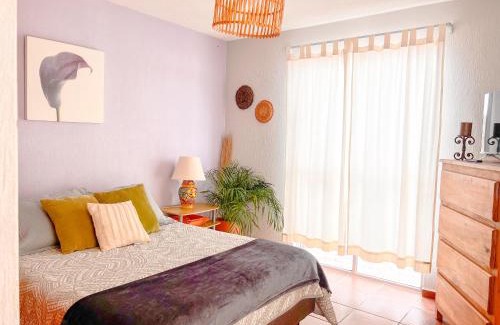 De La Presa Apartment | Colorful family condo with terrace and free parking