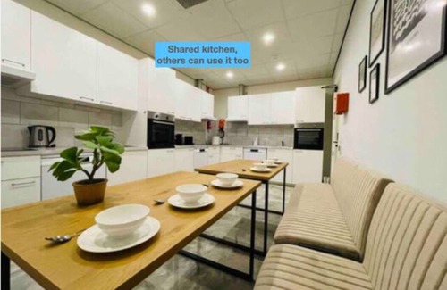 Raamsdonksveer Apartment | Combined rooms, 12 beds, kitchen, and free parking