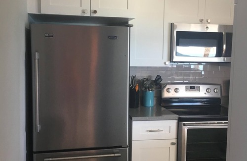 Estate Two Brothers Condo | Come and enjoy 5 miles of beach for your tropical vacation! 🌴