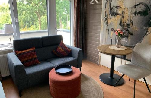 Den Ham Apartment | Comfortabele Familie Suite met 2 slk, speelzolder, balkon, Airco