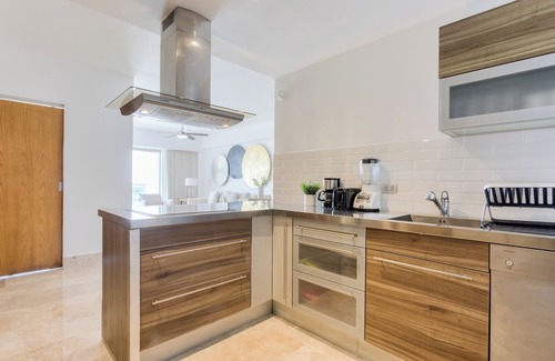 Playa Mujeres Condo | Comfortable 2-Bedroom Condo with AC and Direct Beach Club Entry