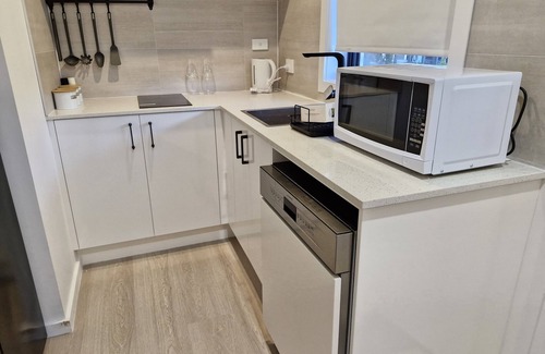 Jacka Apartment | Comfortable Economical and Secure Getaway Apartment w/free parking and wifi