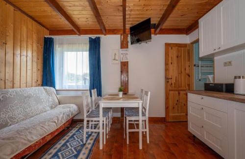 Darlowo House | Comfortable holiday homes with a summer pool