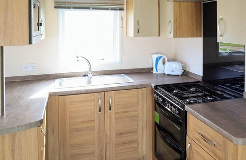 Mablethorpe House | Comfortable modern 12ft-wide caravan with one double and two twin.