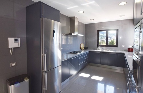 Atlanterra Ski Chalet | Comfortable villa in Cala de los Alemanes, Mediterranean style.
