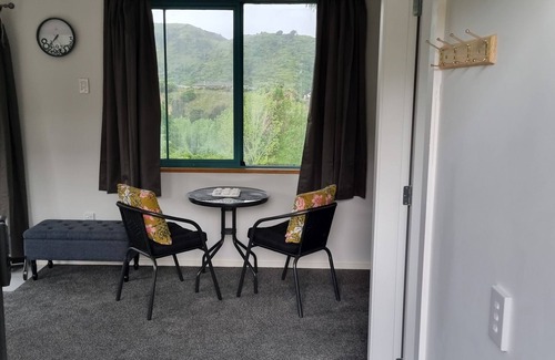 Paraparaumu Cottage | Commune with Nature at Hilltop View in Nikau Valley!