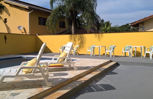 Caraguatatuba House | Cond.P. Patrimonium swimming pool, barbecue, 24h security WI-FI Air Conditioning