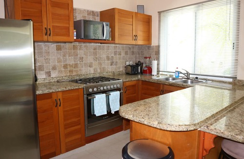 Puerto Aventuras Condo | Condo Bellmare B1 Front Water Lagoon 4 steps to the Pool 1 Min.from the beach