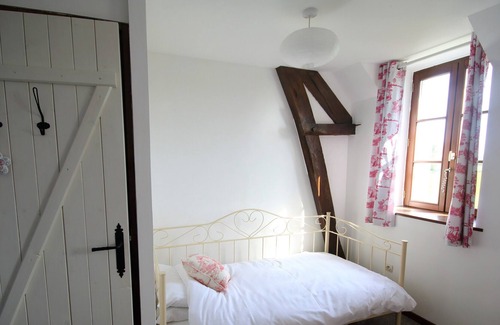St Denis de Gastines Cottage | Cosy cottage with heated swimming pool and Wifi