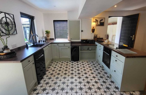 Innellan House | Cosy Coach House next to the beach InnellannLog Burner