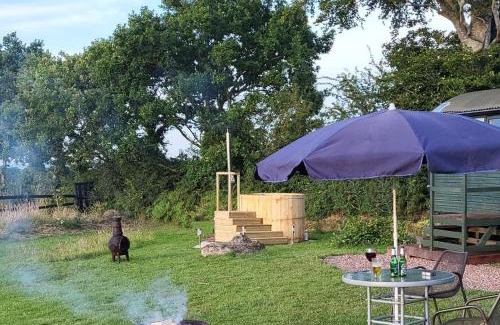 Sticklepath House | Cosy Off Grid Shepherds Hut with Wood Fired Hot Tub