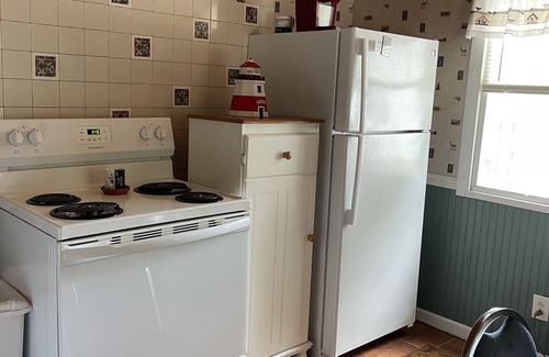 Ludington Cottage | Cottage 5 has a very Hamlin lake cottage feel. More private setting.