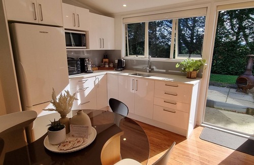 Pyes Pa Apartment | Country Bliss couples oasis, outdoor chiminea in private garden, & sunset deck.