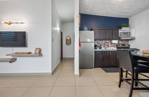 Sabana Llana Norte Apartment | Country Club Oasis - 4BR Retreat W/Hot Tub Bliss