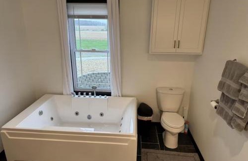 Fairview  Highland County Apartment | Country Cornerstone Retreat Upstairs Apartment with Hot Tub, Jetted Tub, Sauna, Massage Chair, BBQ
