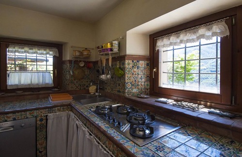 Ranzanico House | Country cottage, stone cottage on garden with lake view, apartment.