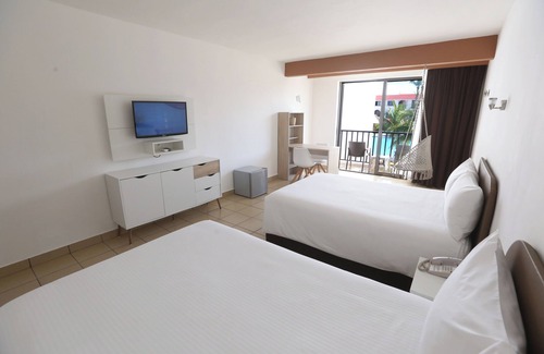 Colonos Cuzamil Hotel | Cozumel Hotel & Resort Trademark Collection by Wyndham All Inclusive