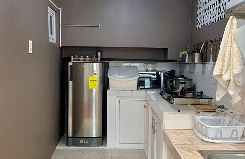Camalig House | Cozy 1 bedroom with sun room and roof deck. Near tourist attractions!