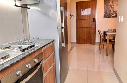 Lapu-Lapu Condo | Cozy 2. 5 bedroom condo with WiFi, fitness room in serene Lapu-Lapu City