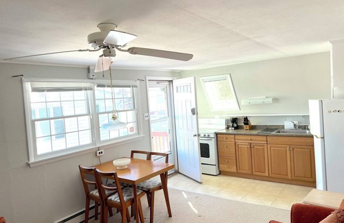 South End Cottage | Cozy 2-bdrm cottage 2nd floor in quiet south end Ocean City. AC, WiFi, big deck.