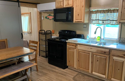 Cottageville Cabin | Cozy 2-bedroom cabin with view of Millcreek in and a private dock.