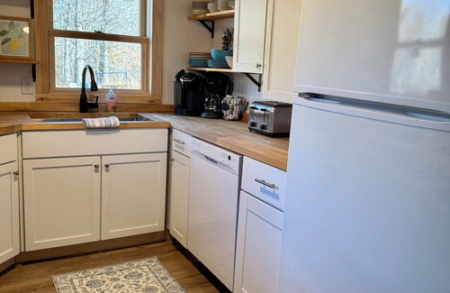 Webb Lake Cabin | Cozy 2 bedroom cabin with fireplace, lake views, steps to sand bottom swimming
