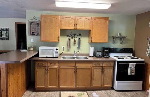 Iron River Cottage | Cozy 2-bedroom cottage on Stanley Lake near Ottawa National Forest.