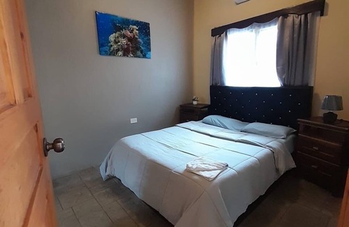 Tela Hotel | Cozy 2-bedroom hotel in wonderful Tela with AC, WiFi