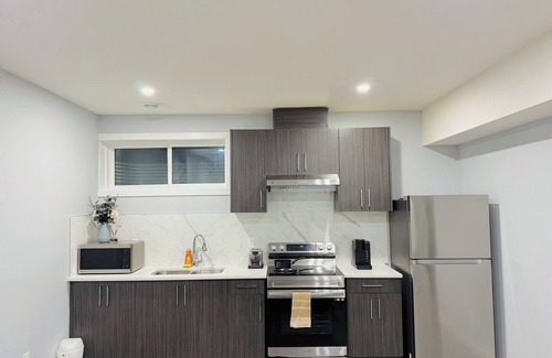 West Edmonton House | “Cozy Basement Retreat”