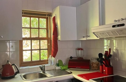 Camps Bay Ski Chalet | Cozy Camps Bay House with mountain and sea view